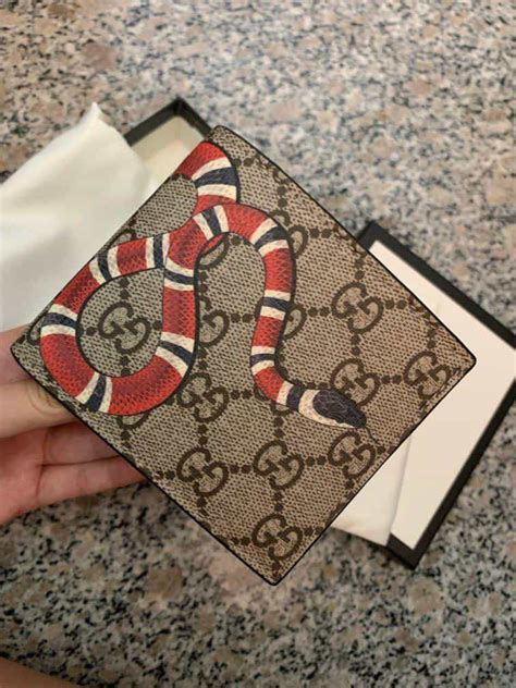 fake gucci wallet|authentic gucci snake wallet.